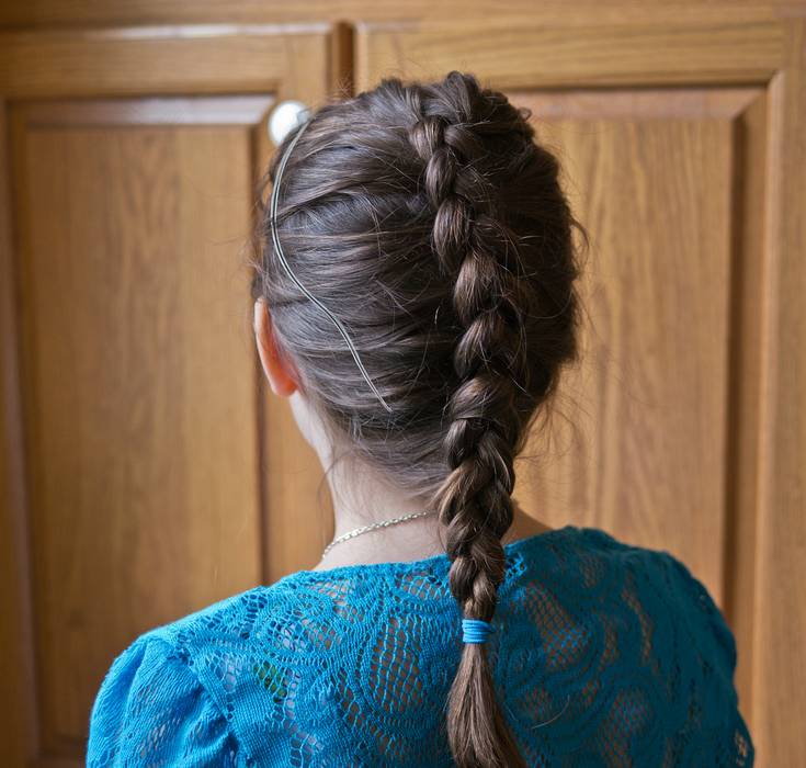 Miranda with Katniss Everdeen hairdo.<br />April 8, 2012 - Easter dinner at Paul and Norma's in Tewksbury, Massachusetts.