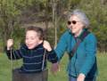 Matthew on swing assisted by Joyce.<br />April 28, 2012 - Winnekenni Park, Haverhill, Massachusetts.