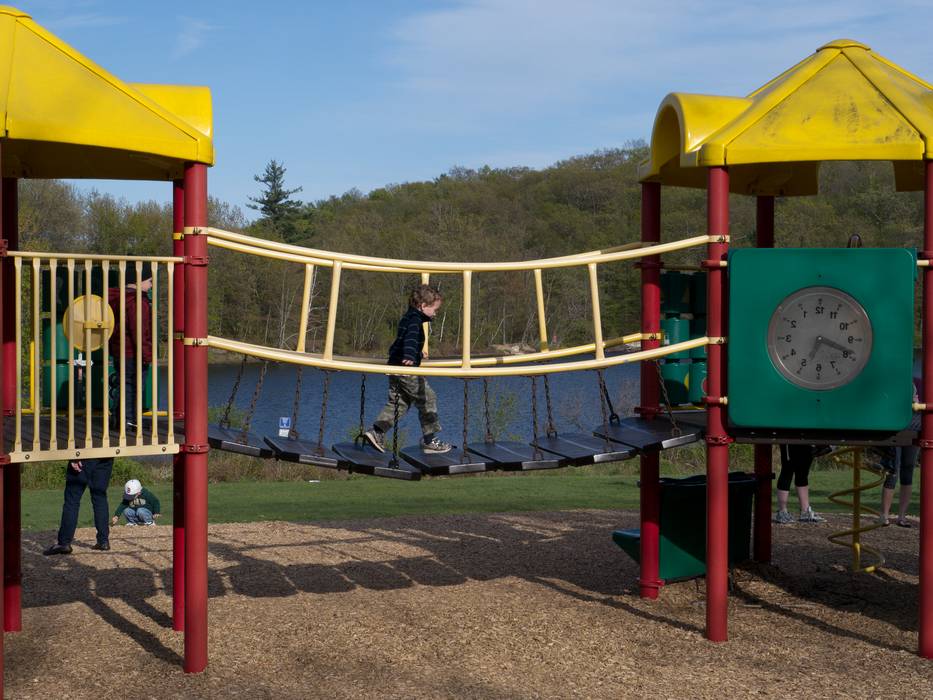 Matthew running on the suspended bridge.<br />April 28, 2012 - Winnekenni Park, Haverhill, Massachusetts.