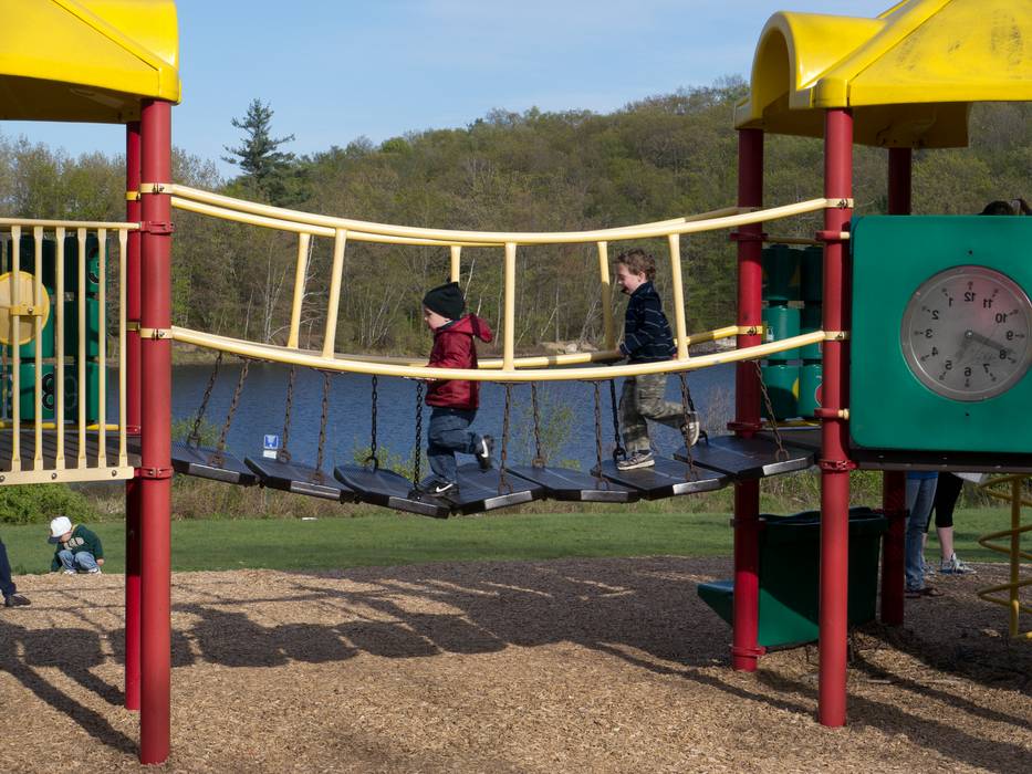 Matthew running on the suspended bridge.<br />April 28, 2012 - Winnekenni Park, Haverhill, Massachusetts.