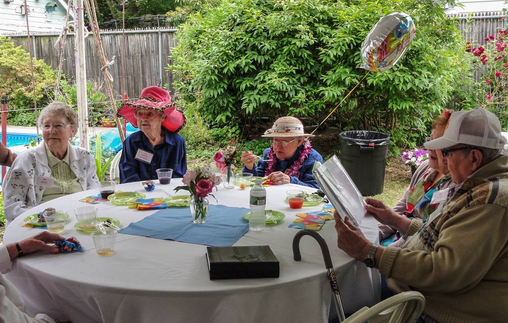 Henrietta in the red hat, Marie in the straw hat, and friends.