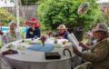 Henrietta in the red hat, Marie in the straw hat, and friends.