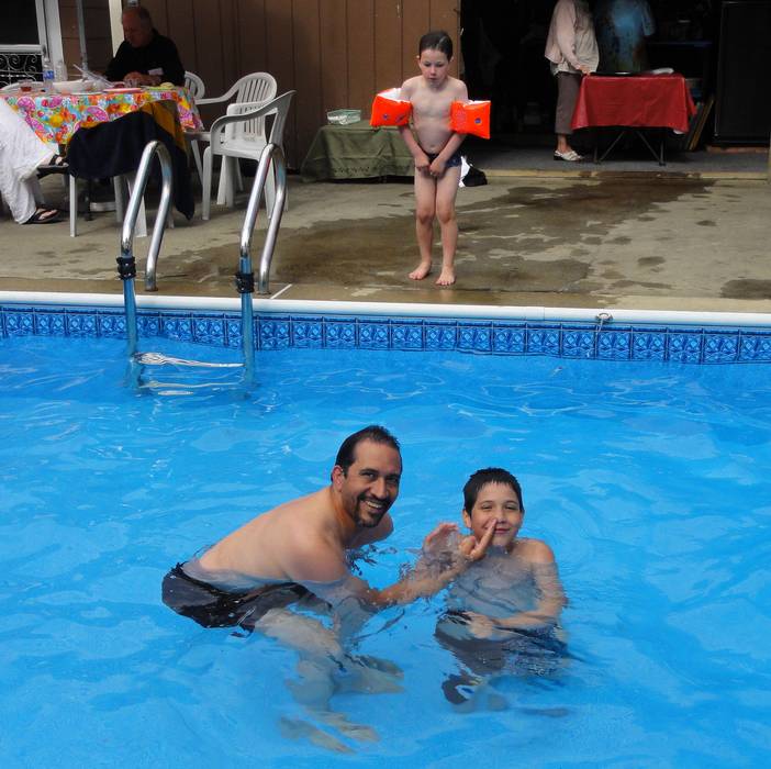 Grandson Eric and his son Gudjn. Gudjn's brother Marks is watching them.