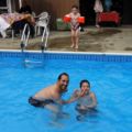 Grandson Eric and his son Gudjn. Gudjn's brother Marks is watching them.