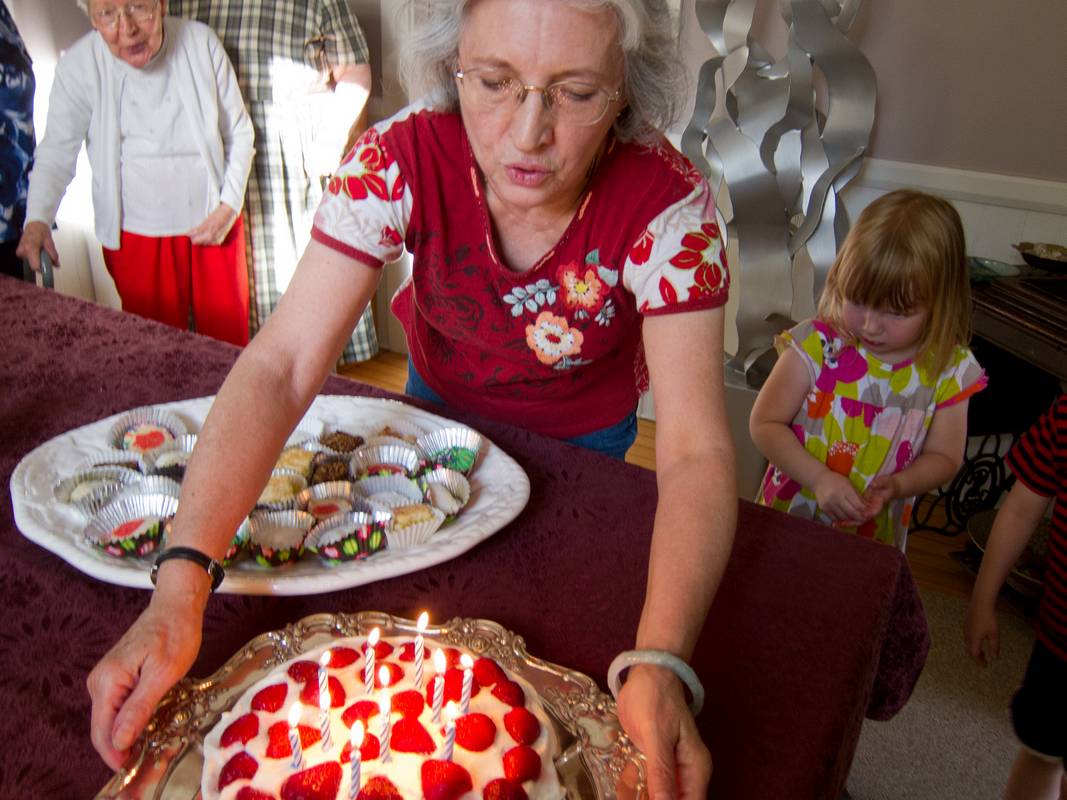 Joyce serving up a birthday cake for Carl and Egils.<br />June 9, 2012 - Merrimac, Massachusetts.