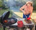 Paul grilling and preparing to grill some more ribs.<br />July 25, 2012 - At Marie's in Lawrence, Massachusetts.