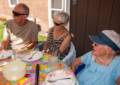 Ronnie, Baiba, and Marie awaiting the ribs.<br />July 25, 2012 - At Marie's in Lawrence, Massachusetts.