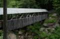 Joyce and Baiba on the covered bridge.<br />July 26, 2012 - At The Flume in Franconia Notch, New Hampshire.