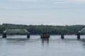 The Merrimack River and the Rocks Village Bridge under repair.<br />July 28, 2012 - Merrimac, Massachusetts.