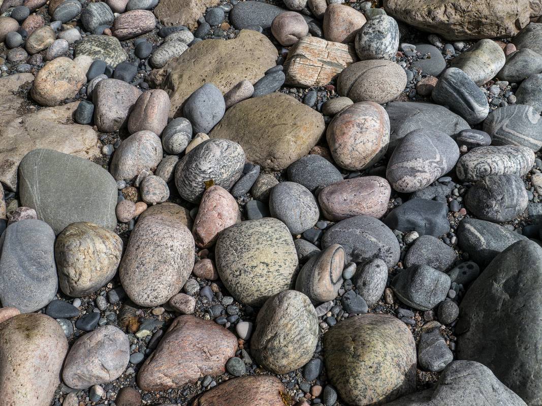 We were amazed by the variety of rocks.<br />July 8, 2012 -The Arches Provincial Park, Portland Creek, Newfoundland, Canada
