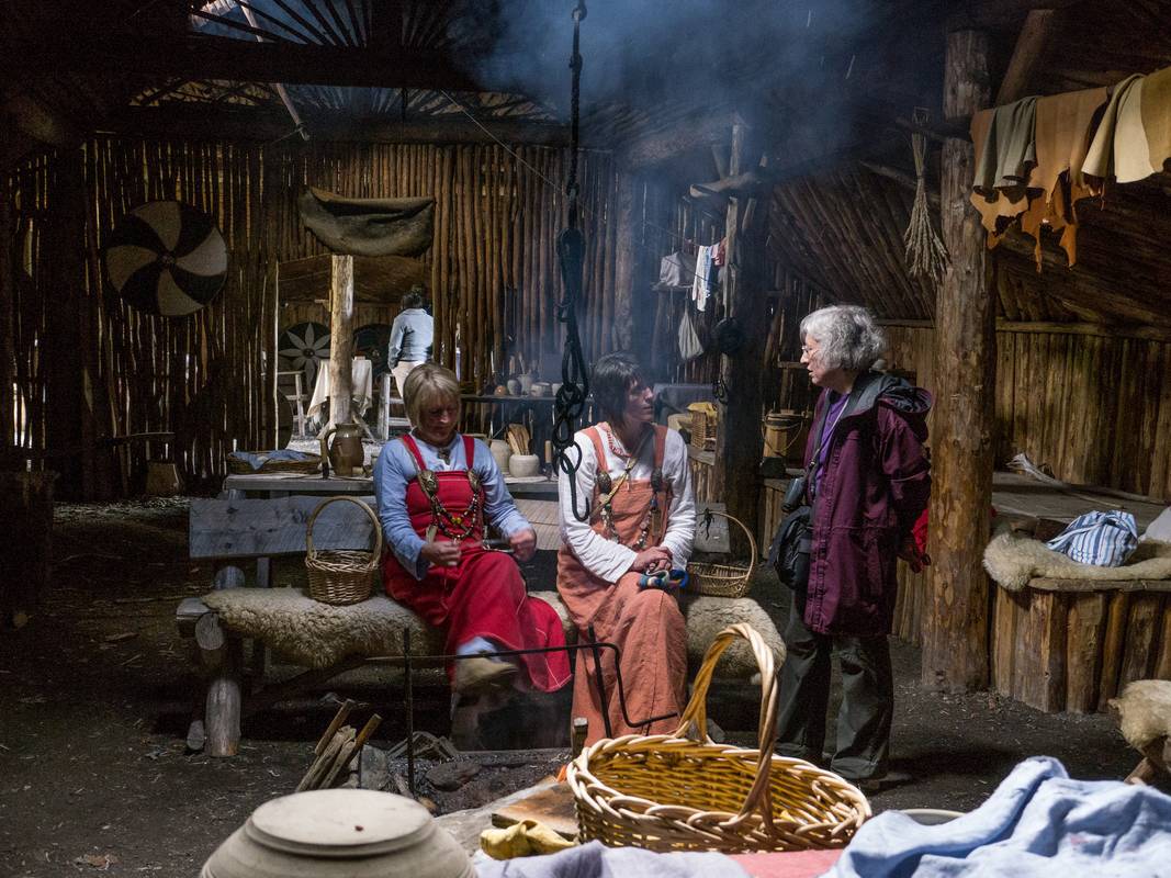 The locals and Joyce chatting.<br />July 9, 2012 - Norstead Viking Village, L'Anse aux Meadows, Newfoundland, Canada.