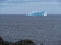 View of iceberg from ridge above the village.<br />July 10, 2012 - St. Carols, Newfoundland, Canada.