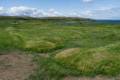 The outline of a long house.<br />July 11, 2012 - L'Anse aux Meadows National Historic Site, Newfoundland, Canada.