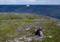 Joyce looking at the little iceberg.<br />July 11, 2012 - Great Brehat, Newfoundland, Canada.