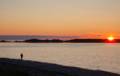 Joyce enjoying the sunset.<br />Beach at Shallow Bay, Gros Morne National Park.<br />June 14, 2012 - Just north of Cow Head, Newfoundland, Canada.