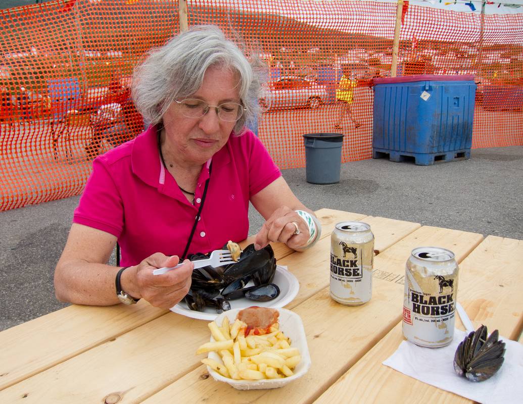 Joyce enjoying some mussels.<br />Codroy Seafest.<br />July 15, 2012 - Codroy, Newfoundland, Canada.