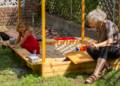 Alina and Joyce playing in the sandbox.<br />August 3, 2012 - At Julian and Gisela's in Brooklyn, New York.