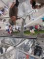 Joyce, Baiba, Ronnie, and camera reflected from panels inside one of the modules of 'Cloud City'.<br />August 3, 2012 - Metropolitan Museum of Art, Manhattan, New York.