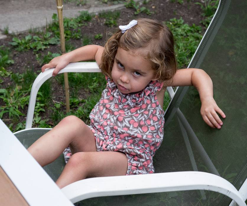 Alina, looking suspiciously at the photographer.<br />August 4, 2012 - At Julian and Gisela's in Brooklyn, New York.
