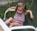 Alina, looking suspiciously at the photographer.<br />August 4, 2012 - At Julian and Gisela's in Brooklyn, New York.