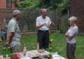 Karl is getting the attention of Ronnie and Baiba.<br />August 4, 2012 - At Julian and Gisela's in Brooklyn, New York.