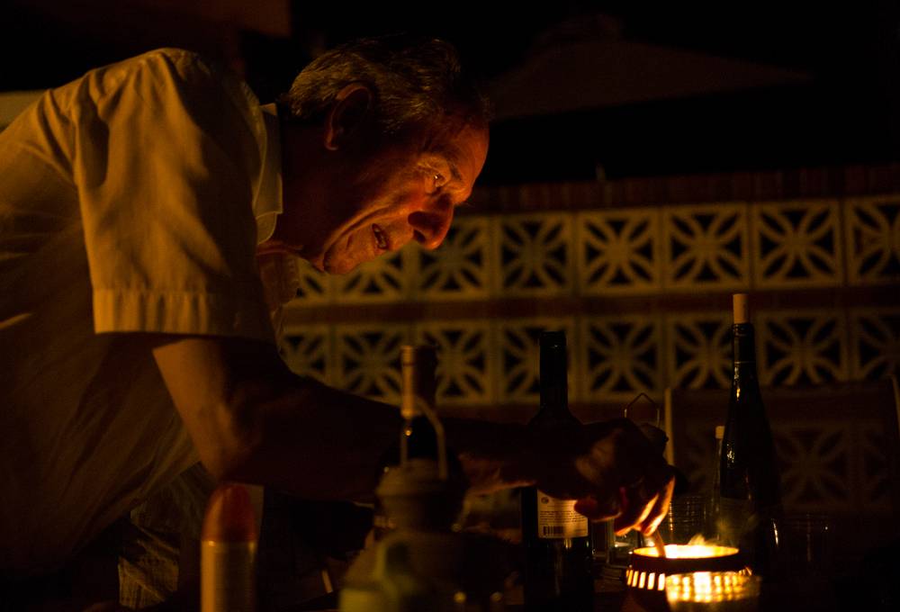 Karl lighting a candle.<br />August 4, 2012 - At Julian and Gisela's in Brooklyn, New York.