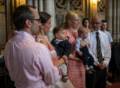 Julian and Gisela with Edgar and Cynthia and Jim with Benjamin listening to the pastor.<br />Edgar's and Benjamin's Christening<br />August 5, 2012 - Queen of All Saints Church, Brooklyn, New York.
