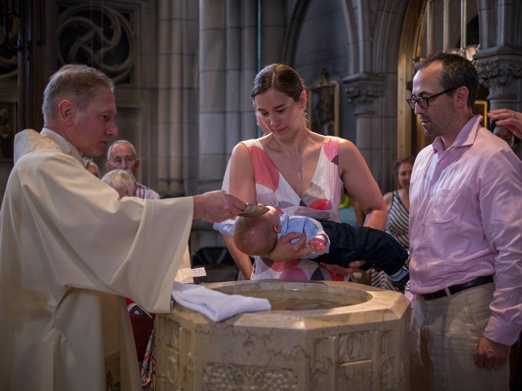 The priest and Benjamin with godparents Gisela and Julian.<br />Edgar's and Benjamin's Christening<br />August 5, 2012 - Queen of All Saints Church, Brooklyn, New York.