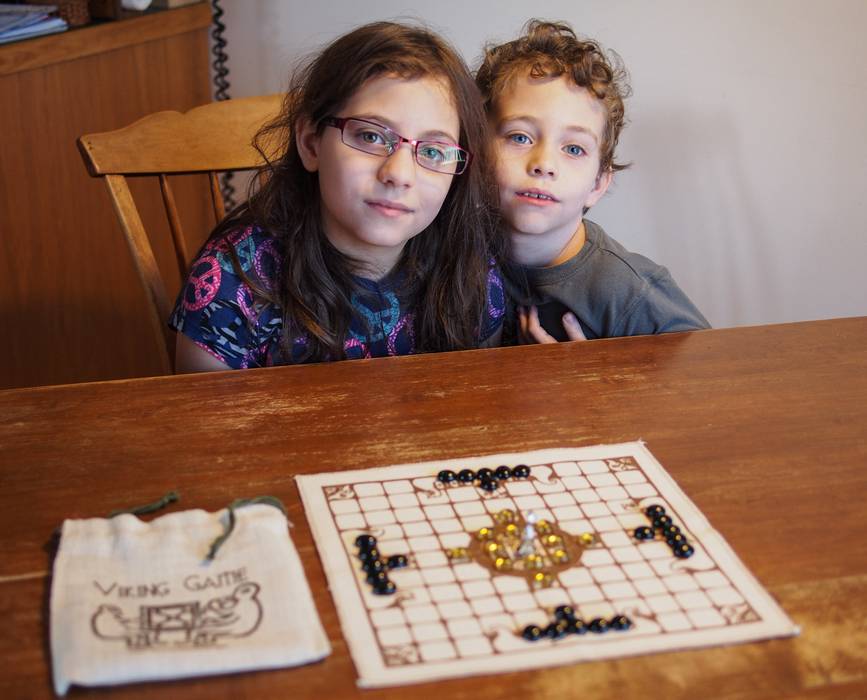 Miranda, Matthew and Hnefatafl (the kings table) Viking game.<br />Nov. 25, 2012 - Merrimac, Massachusetts.