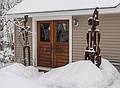 Entrance to Joyce's studio guarded by two of her sculptures.<br />The morning after a sitcky snowfall.<br />Feb. 25, 2013 - Merrimac, Massachusetts.
