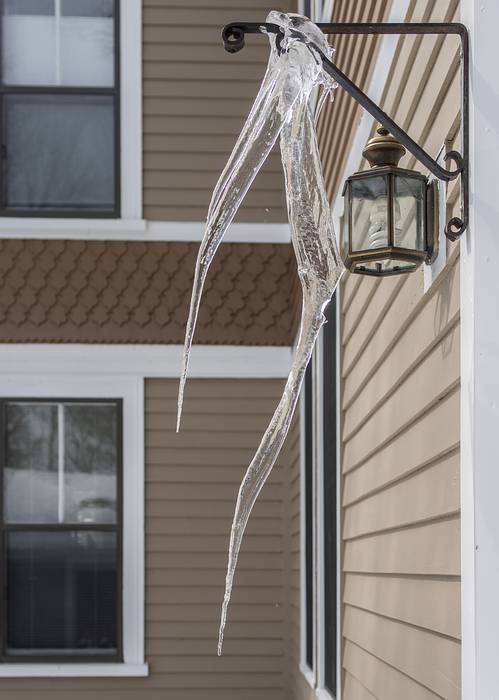 Unusual icicle by the back door.<br />March 21, 2013 - Merrimac, Massachusetts.