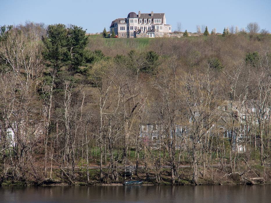 Big house replaced an apple orchard in West Newbury.<br />May 1, 2013 - Merrimac, Massachusetts.