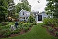 Joyce refurbishing one of her sculptures on a customer's site.<br />May 26, 2013 - Concord, Massachusetts.