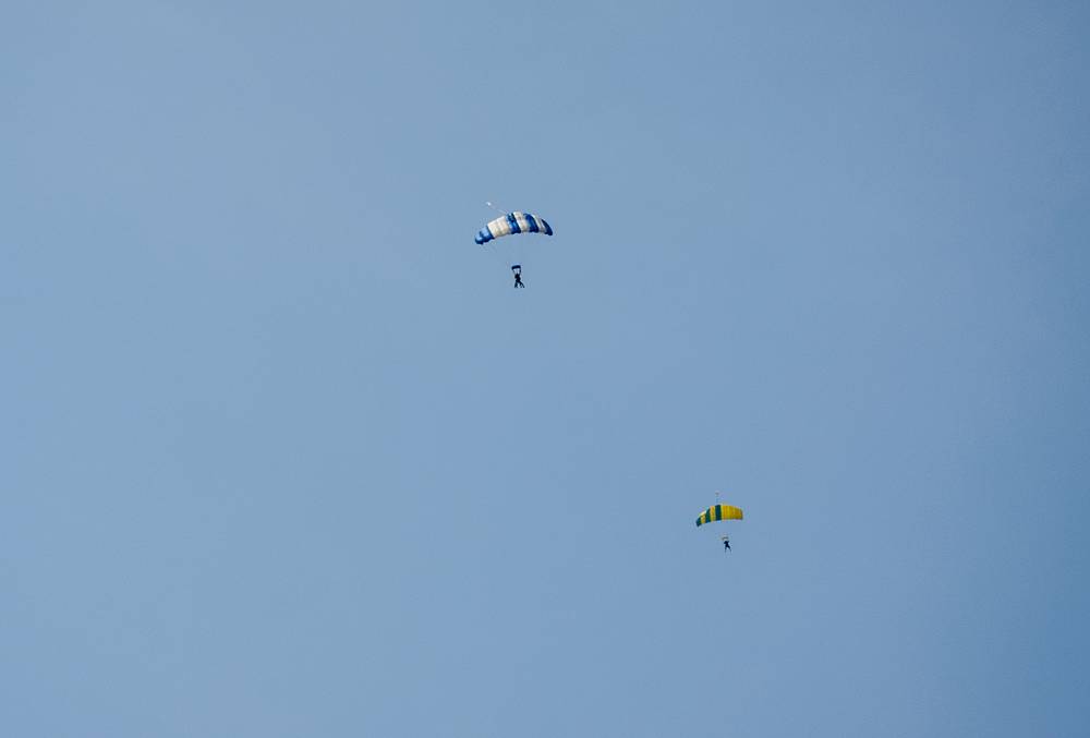 Watching paragliders while waiting for our table.<br />Breakfast at Hangar B.<br />June 22, 2013 - Chatham airport, Chatham, Massachusetts.