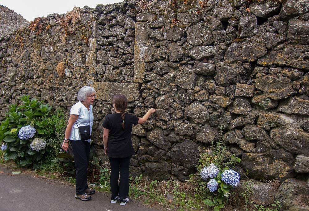 Joyce and Miranda admiring the lava rock wall.<br />July 2, 2013 - At Melody and Sati's in Livramento, Sao Miguel, Azores, Portugal.