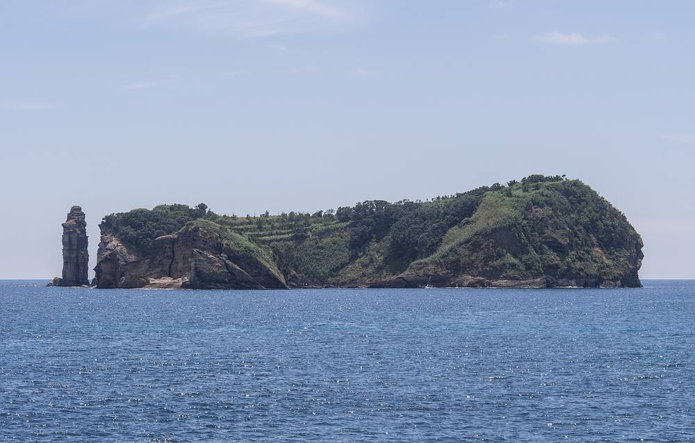 View of the volcanic island from the pier.<br />July 10, 2013 - Vila Franca do Campo, Sao Miguel, Azores, Portugal.