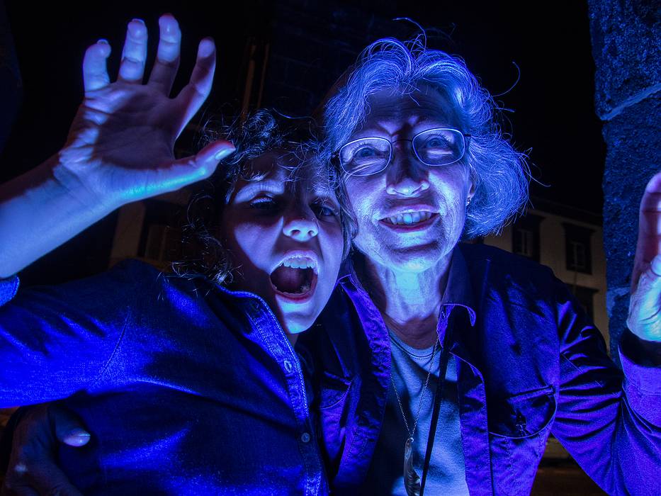 Miranda and Joyce in the floodlights of the city gate.<br />July 10, 2013 - Ponta Delgada, Sao Miguel, Azores, Portugal.