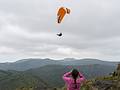 Miranda observing a second paraglider.<br />July 12, 2013 - Pico do Fogo, Sao Miguel, Azores, Portugal.