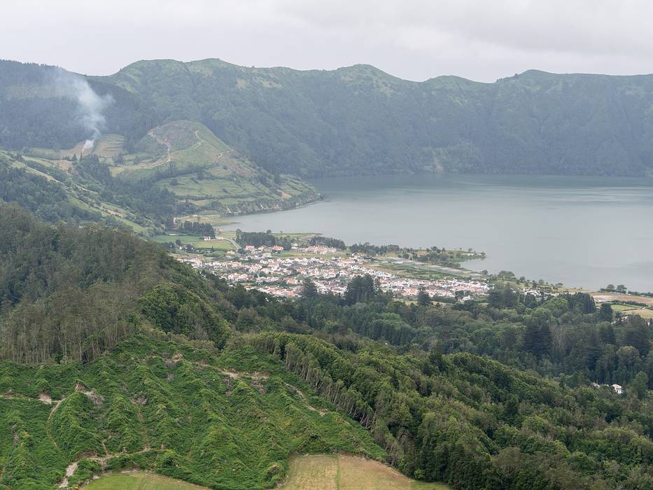 The town of Sete Cidades on the shores of Blue Lake.<br />July 13, 2013 - Hike along rim of crater at Sete Cidades, Sao Miguel, Azores, Portugal.
