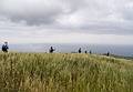 Baiba, Joyce, Sati, Miranda, Ronnie, and Melody on the lookout for the perfect lunch spot.<br />July 13, 2013 - Hike along rim of crater at Sete Cidades, Sao Miguel, Azores, Portugal.