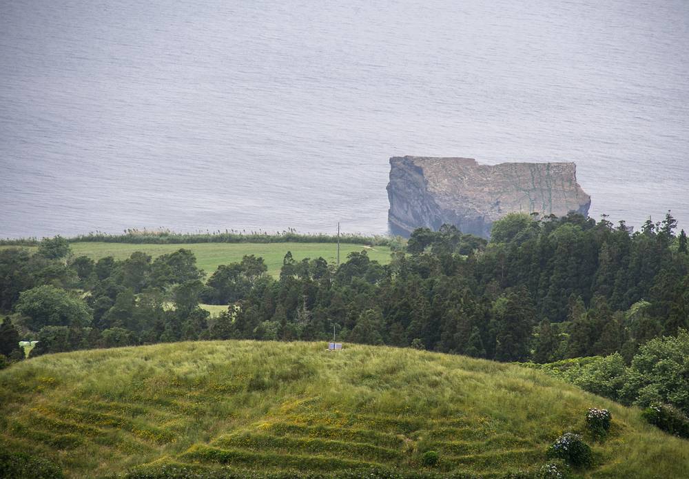 Big rock off western coast.<br />July 13, 2013 - Hike along rim of crater at Sete Cidades, Sao Miguel, Azores, Portugal.
