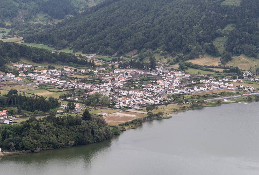 Town of Sete Cidades on Blue Lake.<br />July 13, 2013 - Hike along rim of crater at Sete Cidades, Sao Miguel, Azores, Portugal.