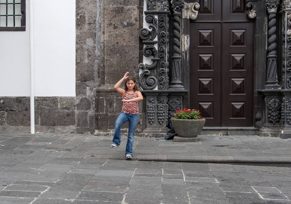 Miranda doing her yoga poses in front of the church.<br />Matriz Square.<br />July 14, 2013 - Ponta Delgada, Sao Miguel, Azores, Portugal.