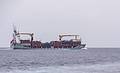 A container ship.<br />July 15, 2013 - On whale watch boat out of Ponta Delgada, Sao Miguel, Azores, Portugal.