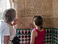 Joyce and Miranda admiring the intricate wall patterns in the Comares.<br />July 4, 2013 - At the Alhambra in Granada, Spain.