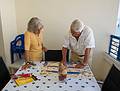 Joyce and Salvador going over the plans for the day.<br />July 5, 2013 - Marbella, Spain.