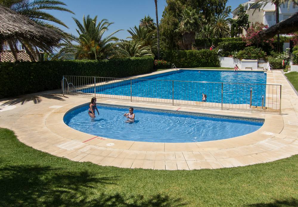 Miranda and Paula in pool of the condominium complex,<br />where Salvador and Asuncion's new (renovated) house iis part of.<br />July 5, 2013 - Marbella, Malaga, Spain.