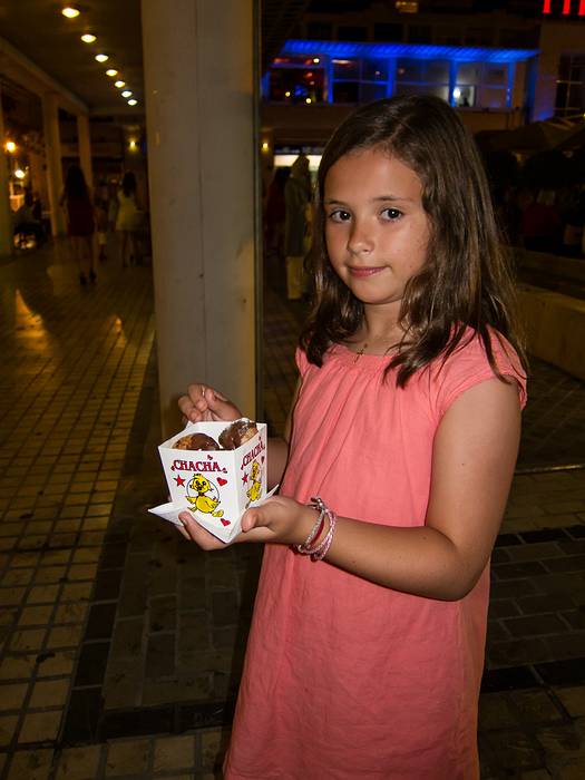 Paula and her buñuelos.<br />July 5, 2013 - Puerto Banus, Marbella, Malaga, Spain.