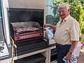 Salvador grilling some lamb chops.<br />July 7, 2013 - At Salvador and Asuncion's in Madrid, Spain.