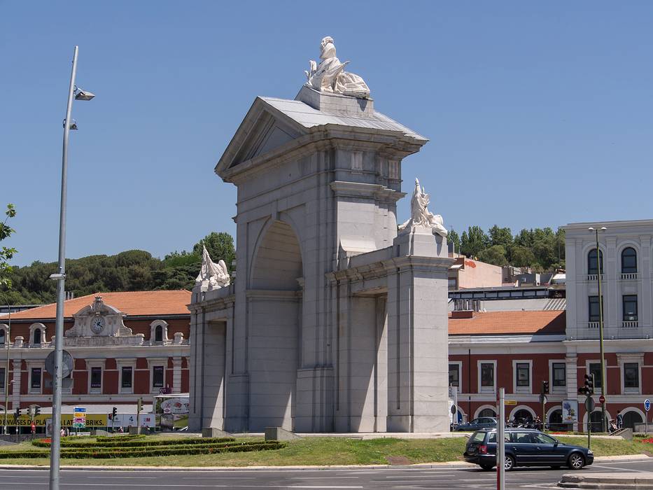 Puerta de San Vicente with the Estacion del Norte train station in back.<br />July 8, 2013 - Madrid Rio Park, Madrid, Spain.